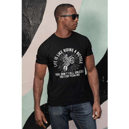 Unisex garment-dyed heavyweight t-shirt with "Life Is Like Riding A Bicycle" print, relaxed fit, 100% ring-spun cotton, casual style.