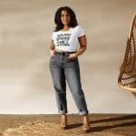 Women's fitted crop tee with "Intelligent, Strong, Amazing" graphic, lightweight cotton-poly blend, ethical sourcing.