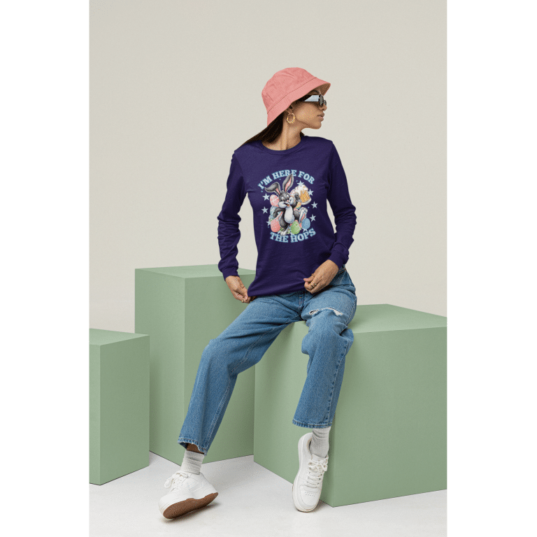 Unisex long sleeve tee, "I'm Here For The Hops," with whimsical rabbit graphic, soft cotton, regular fit.
