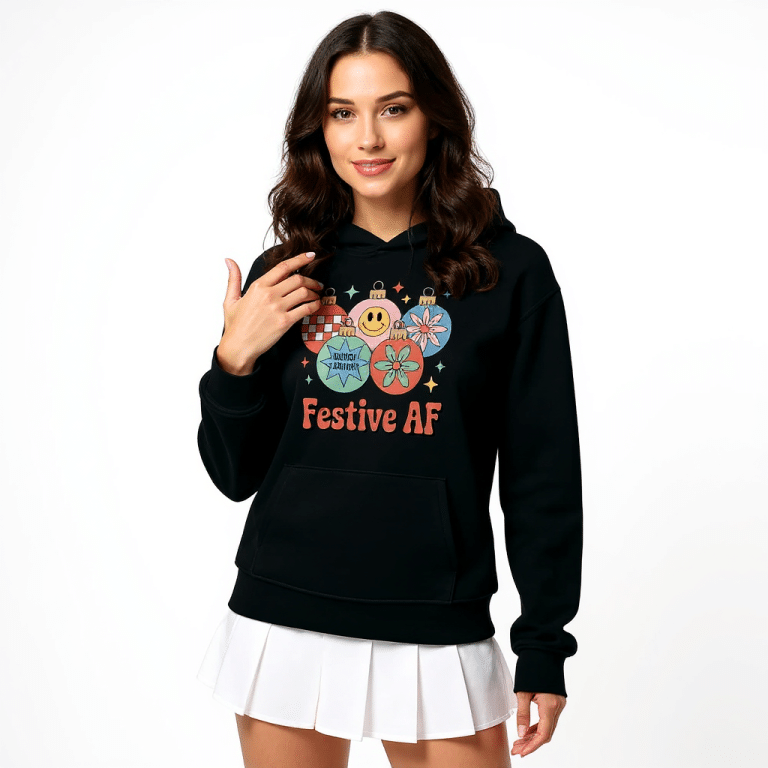 Oversized heavyweight hoodie in festive style, thick brushed fleece, unisex fit, no-drawcord hood, front pocket, holiday graphic.