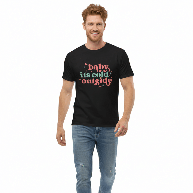 Unisex classic tee 'Baby It's Cold Outside' in festive typography, 100% cotton, soft winter style.