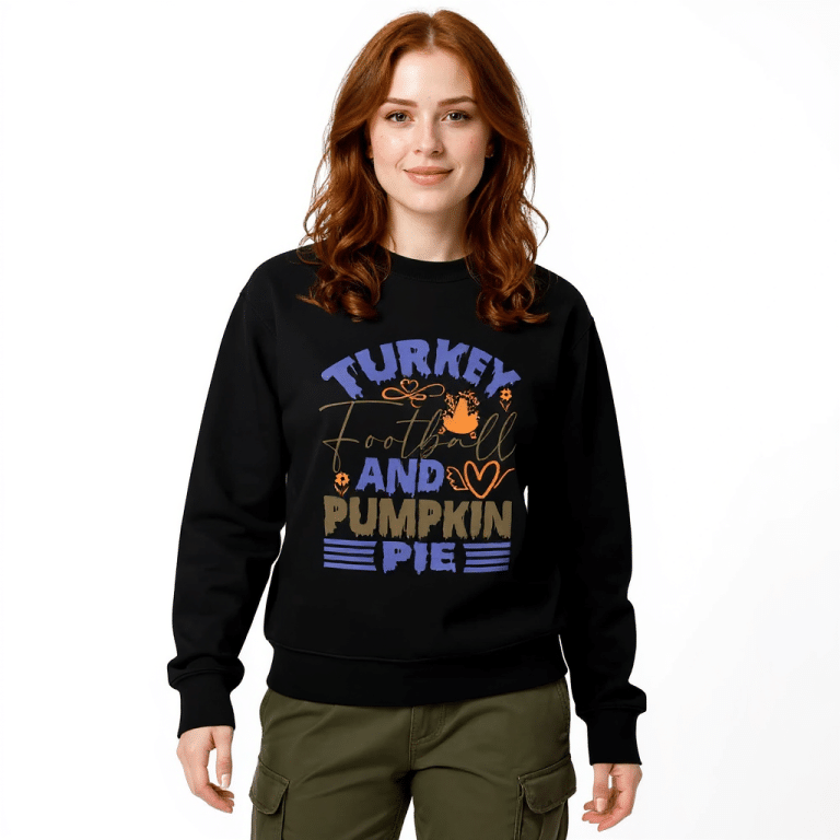 Unisex organic cotton sweatshirt in regular fit with playful turkey, football & pumpkin pie graphic, perfect for fall festivities.