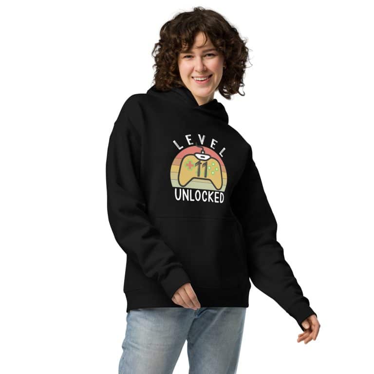 Unisex oversized hoodie Level Unlocked, relaxed fit, 80% cotton, lined pullover hood, kangaroo pocket, sustainable style.