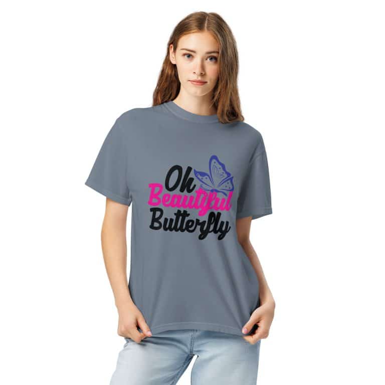 Unisex garment-dyed heavyweight t-shirt featuring colorful butterfly design and bold "Oh Beautiful Butterfly" text, relaxed fit, 100% cotton.
