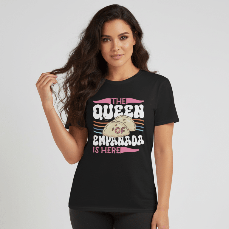 Gildan short-sleeve unisex t-shirt, white, with 'The Queen of Empanadas is Here' design, 100% ring-spun cotton.