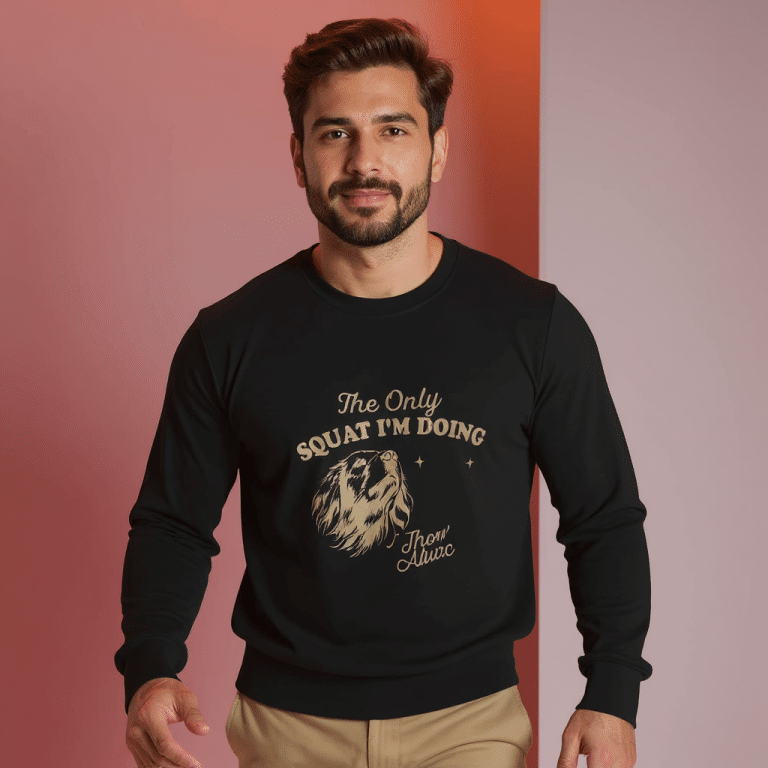 Unisex sweatshirt with 'The Only Squat I'm Doing' slogan, classic fit, cotton-polyester, in white and orange.