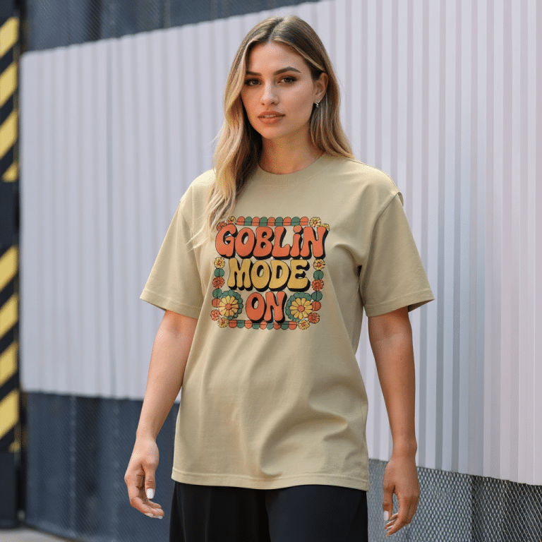 Oversized faded t-shirt in vibrant colors with "Goblin Mode On" design, perfect for casual style and ultimate comfort.