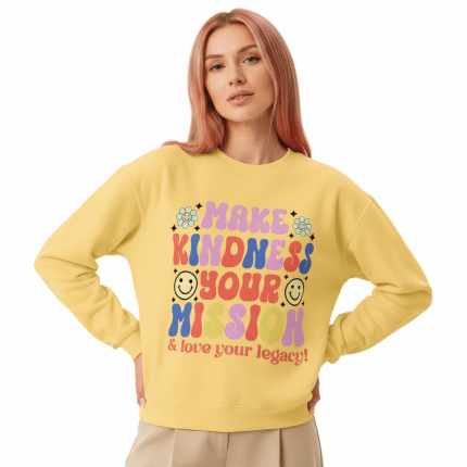 Unisex garment-dyed fleece crewneck sweatshirt in soft cotton, vintage style with "Make Kindness Your Mission" print, relaxed fit.