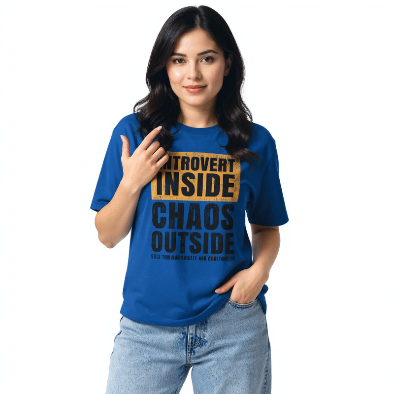 Unisex fitted t-shirt in black with "Introvert Inside Chaos Outside" design, lightweight cotton-poly blend, modern silhouette.
