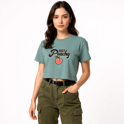 Peach women's crop top from AS Colour, soft combed cotton, relaxed fit with ribbed neck and dropped shoulders.
